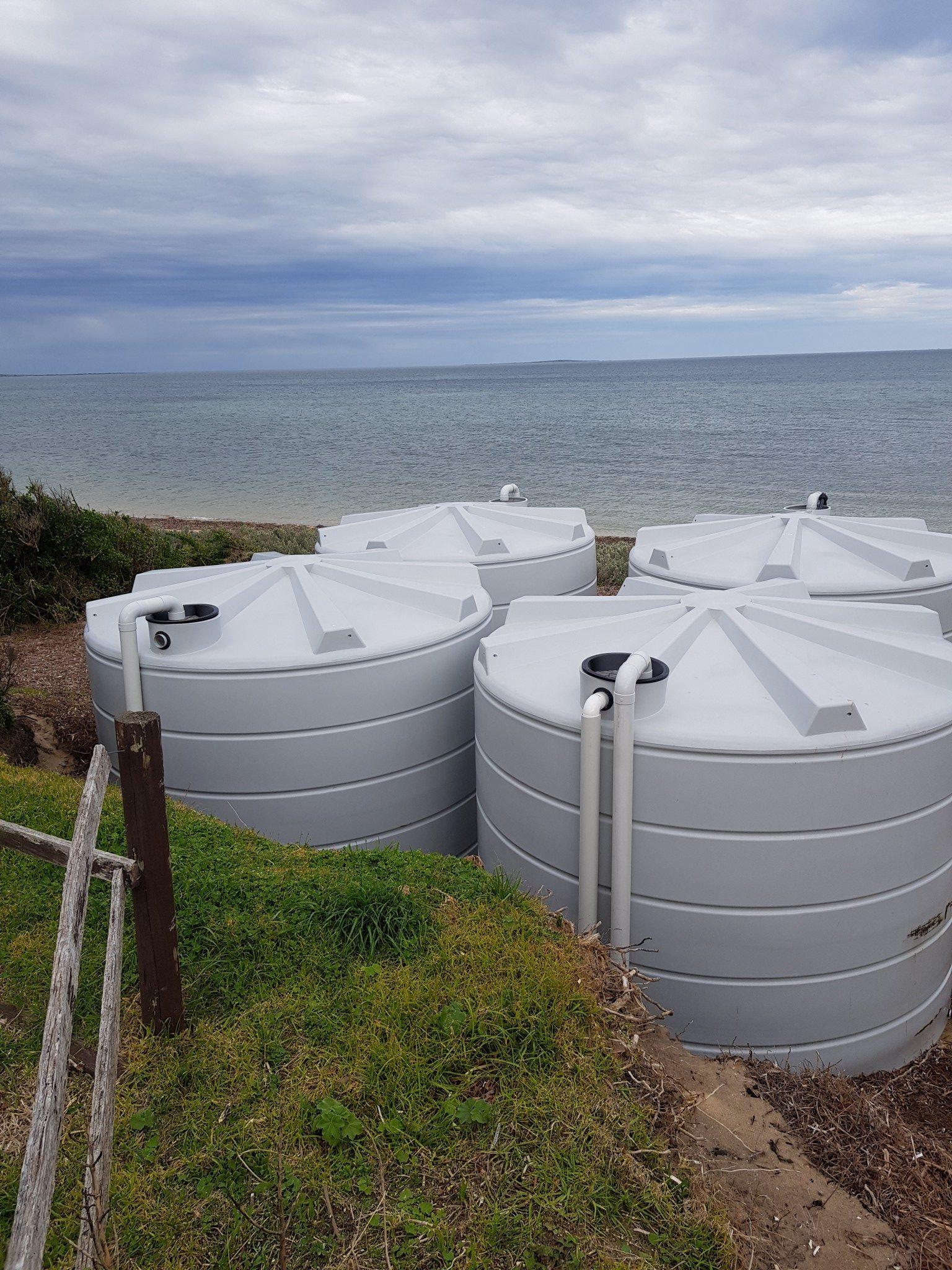group of 4 rainwater tanks