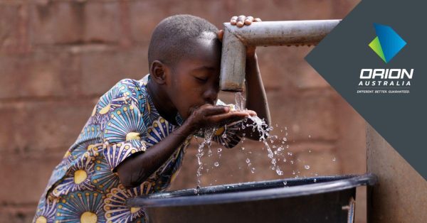 Senegal boy drinking water from a tap