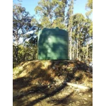 26000 Ltr Panelled Wall Rainwater Tank sitting on raised earth base.