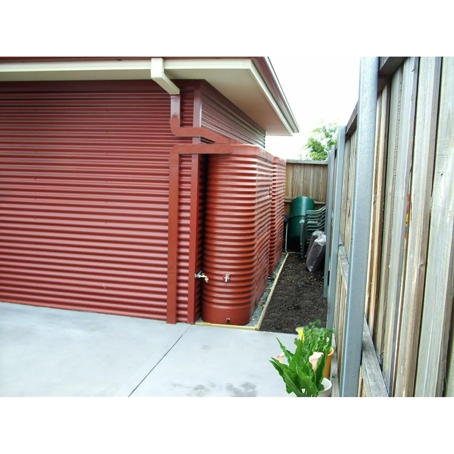 Two Orion Australia 2000 Ltr Corrugated Slimline Tanks used when space is a premium.