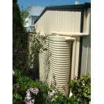 Two 2000 Ltr Corrugated Slimline Tanks hiding away in a secret garden behind shed to utilise limited space